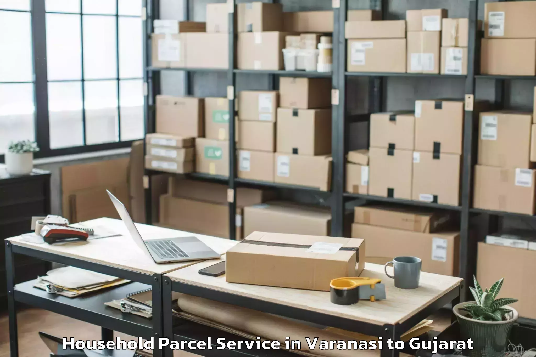 Reliable Varanasi to Rai University Ahmedabad Household Parcel